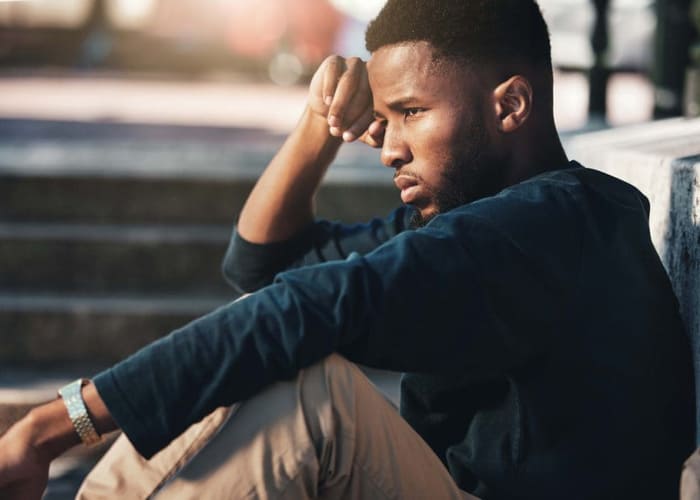 male-college-student-looking sad