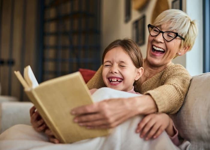 grandmom-reading-to-grandaughter-after-therapy